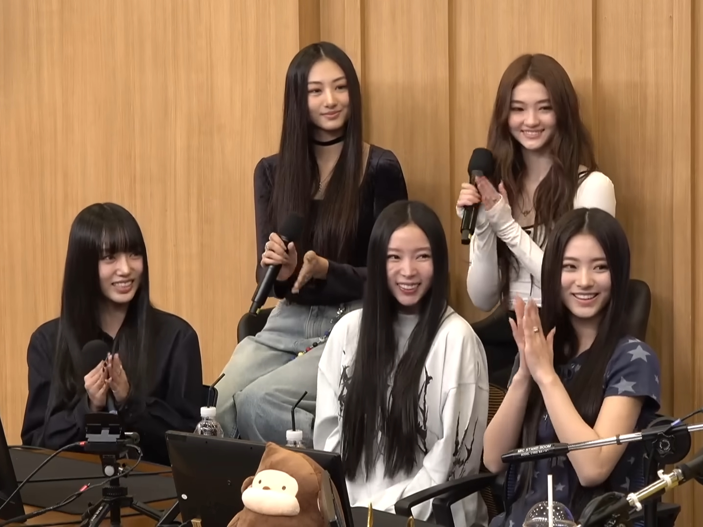 MEOVV's five members at SBS Radio in November 2024; archive photograph