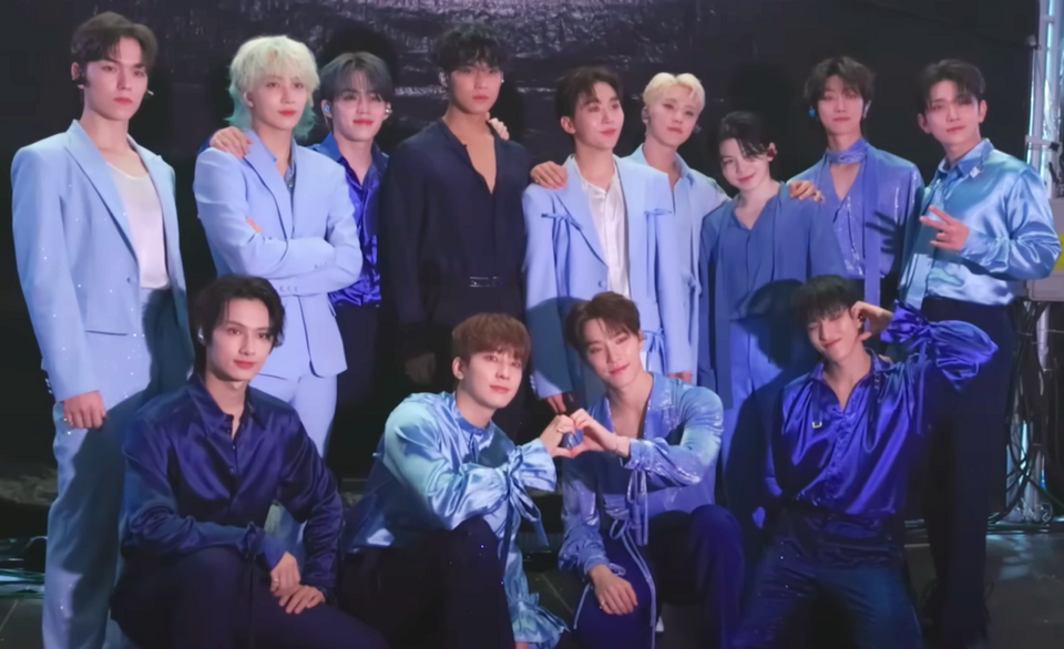 SEVENTEEN posing together in a historical Caratland group image